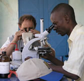 user with microscope